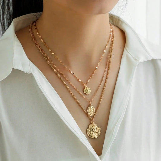 One-piece Women's Triple-Layered Necklace with Metal Coin, Eye Shape, and Virgin Mary Pendant.