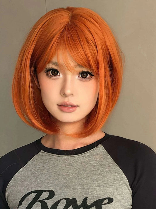 Synthetic bob wigs for women: Black short bob wig with straight human hair and bangs, fully machine made for a natural black look.