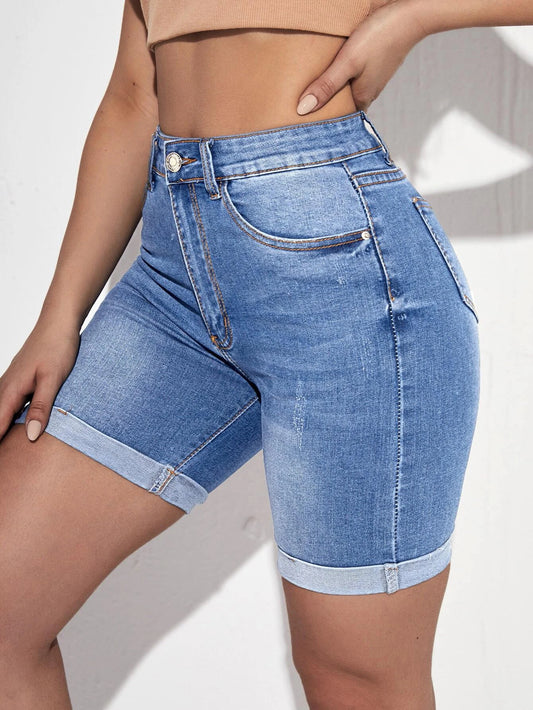 Denim shorts with rolled-up hems