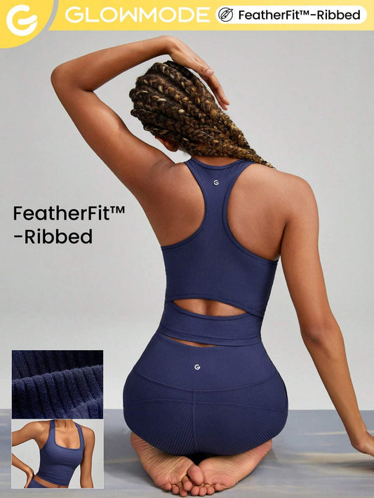 Ribbed cropped sports bra with a racerback design and cut-out detailing. Provides light support for low-impact activities such as yoga and daily wear.