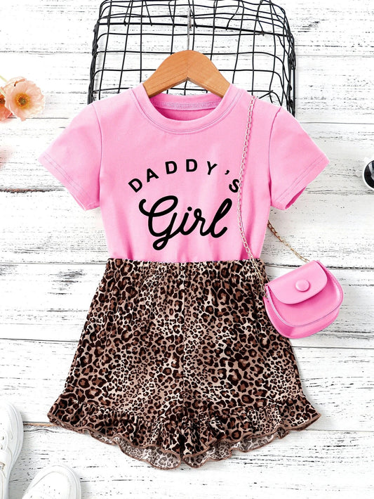 A letter graphic tee paired with leopard ruffle hem shorts for young girls