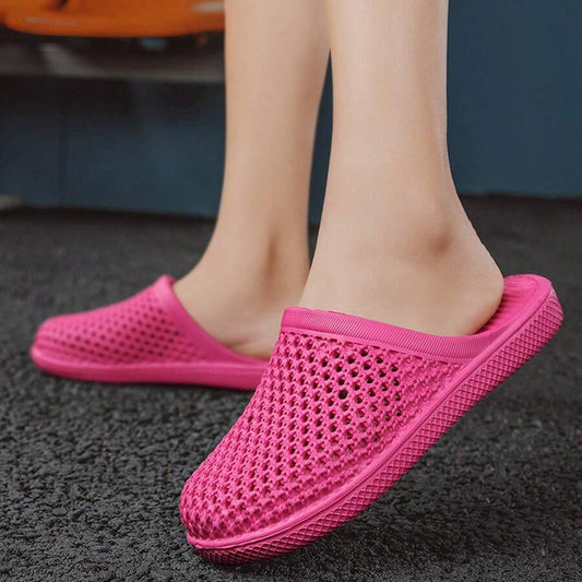 Granny flat slippers for women suitable for all seasons. Made from waterproof and durable rubber material, perfect for bathroom use and water activities.