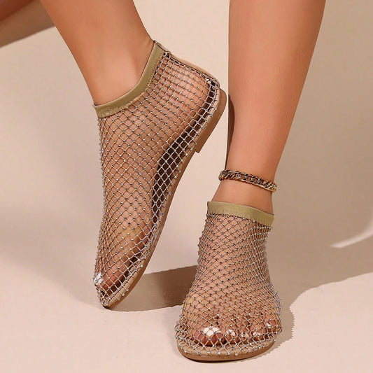 Flat Sandals for Women adorned with Rhinestone Decor on Shiny Mesh, embodying a Summer Vacation Style in Black.