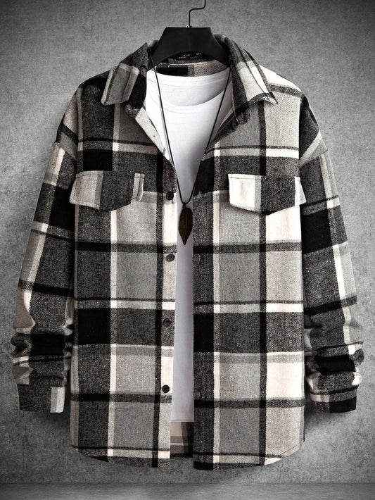 Manfinity Homme presents a loose-fitting men's plaid overcoat with flap detailing and a drop shoulder design. Tee not included.