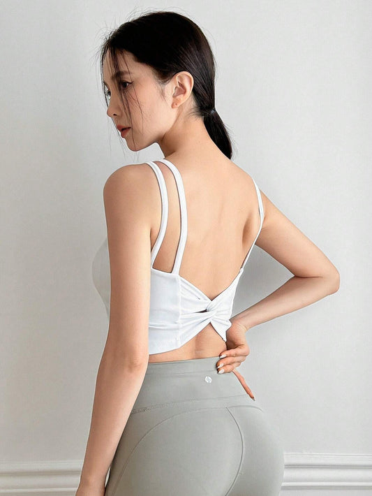 Sports bra with a twisted back design, enhancing the beauty of your back while providing a push-up effect.