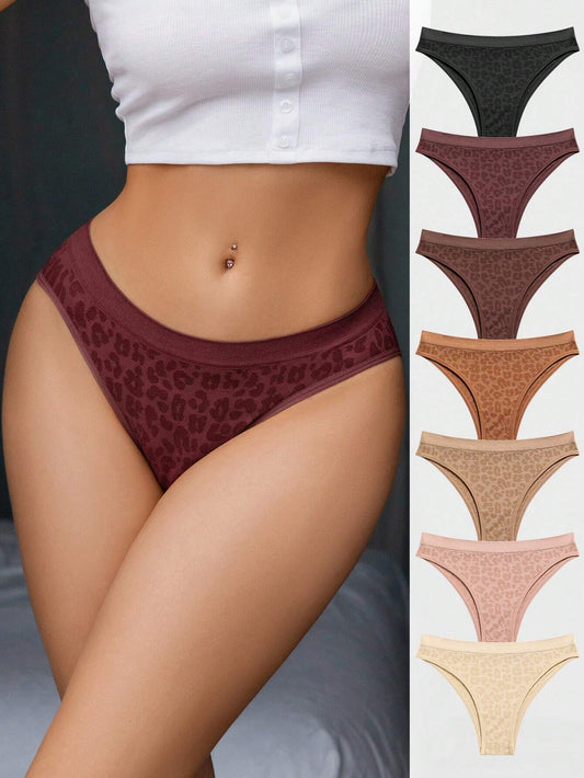 Set of seven panties with leopard jacquard pattern.