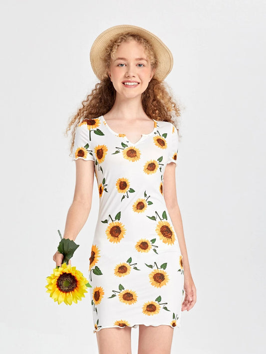 Dress with an allover sunflower print, notch neckline, and lettuce trim, designed for teenage girls.