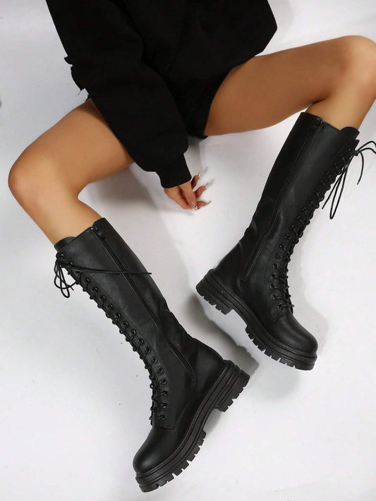 Black Platform Wedge Boots for Women with Mid-Calf Length and Lace-Up Design, Adding Fashionable Flair.