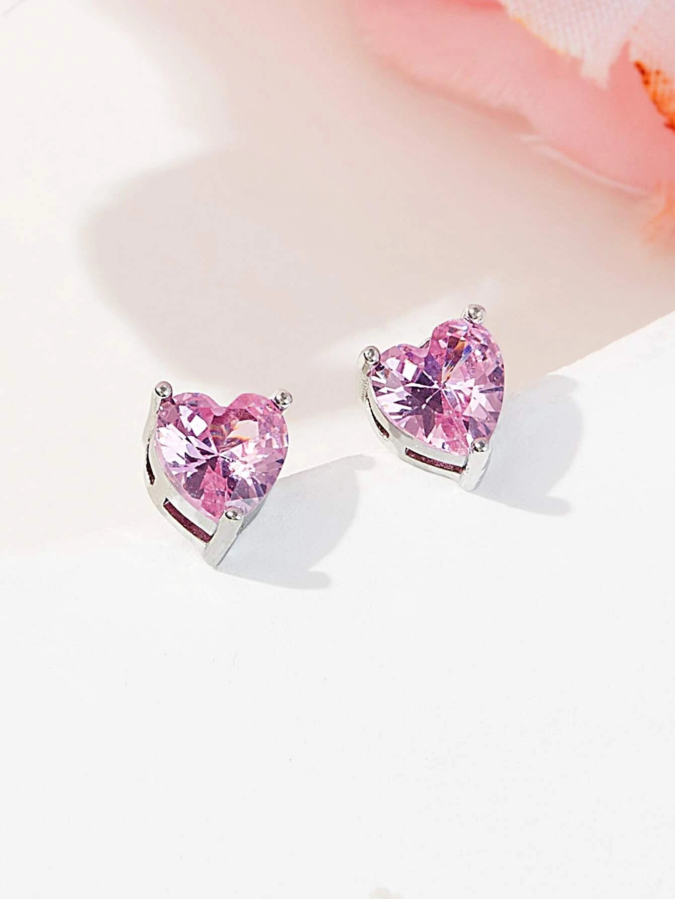Set of 4 Earrings Decorated with Cubic Zirconia Bows and Hearts.
