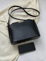 Minimalist Black Dome Bag with Metal Decor