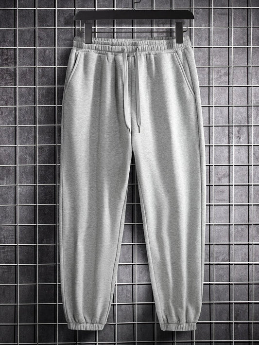 Men's Sweatpants with Slant Pockets and Loose Fit, available in Solid Color
