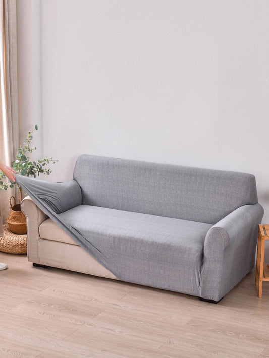 Minimalist All-Inclusive Plain Stretchy Sofa Slipcover, designed to protect your living room furniture from dust.