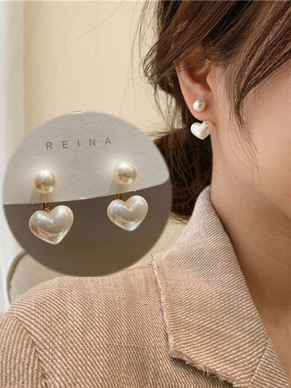 Versatile Small Love Pearl Earrings with a Simple Design, embodying the Korean Dongdaemun girl style and Internet celebrity temperament.